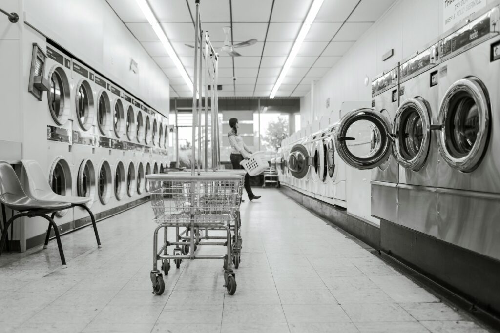 a laundromat in black and white