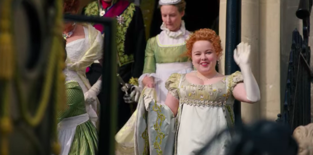 Penelope waving to Eloise.
