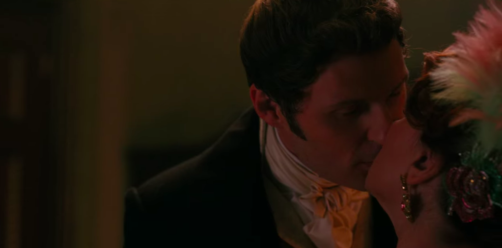 Lord Featherington kisses Lady Featherington.