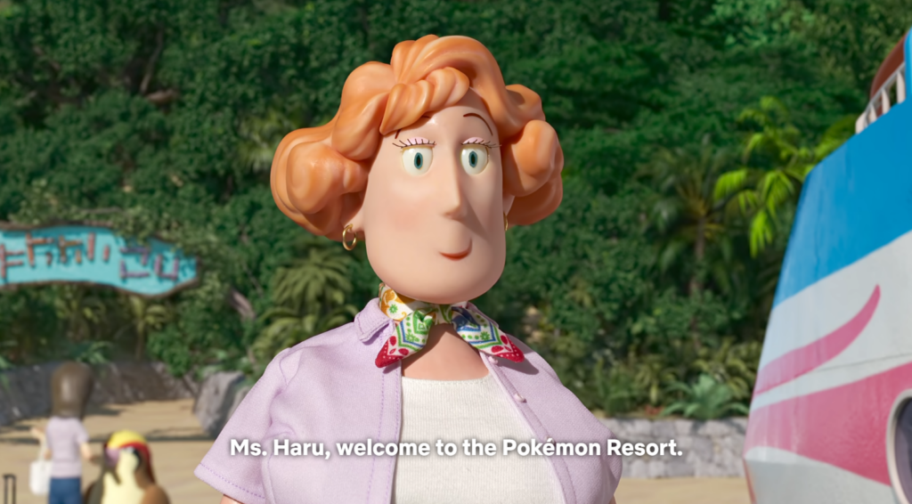 The kindly, red-haired Mrs. Watanabe from Pokemon Concierge saying "Ms. Haru, welcome to the Pokemon Resort."
